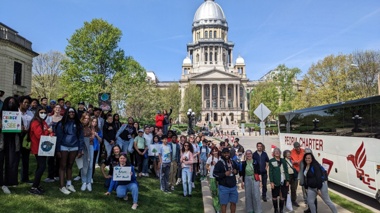 group of Lobby Day participants gathered outside of the Illinois State Capitol building