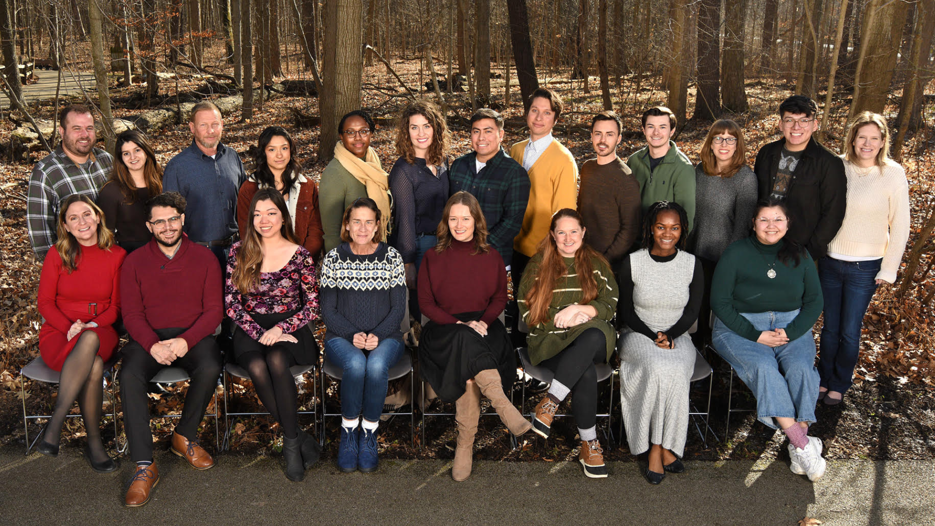 group of IEC staff in a wooded area during fall colors