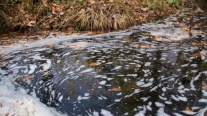 microplastics swirl in a pool of fresh water
