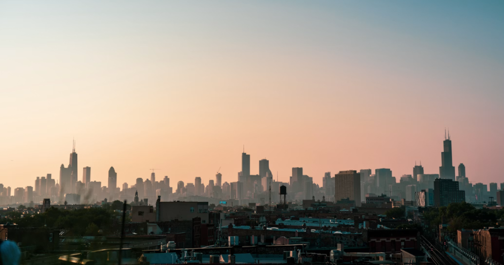 View of the Chicago skyline with a hazy sunset.