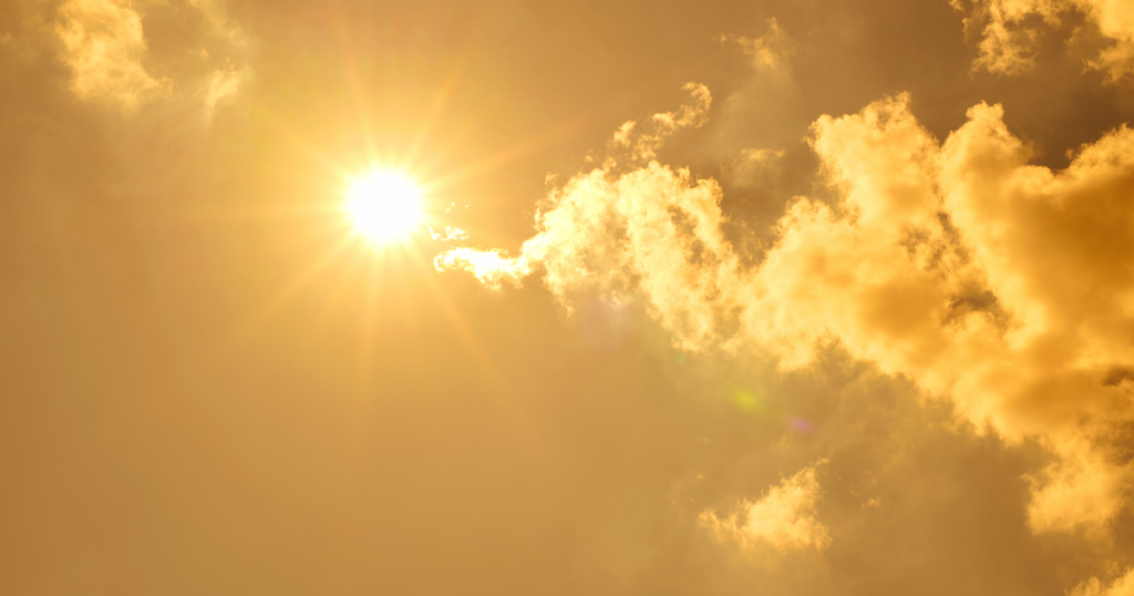 Orange sun and clouds.